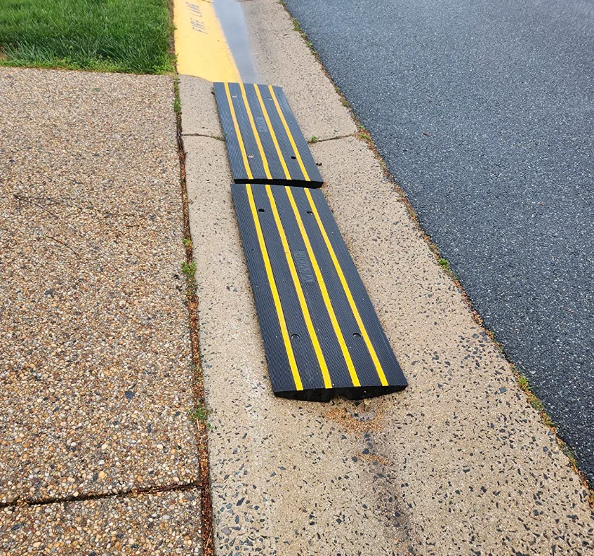 A curb ramp kit with easy installation steps for driveways